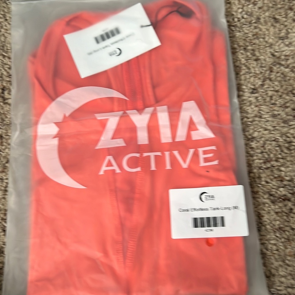 ZYIA ACTIVE Coral Effortless Tank-Long (M) as pictured active wear.